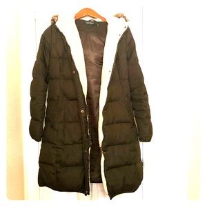 Warm, above knee faux fur parka